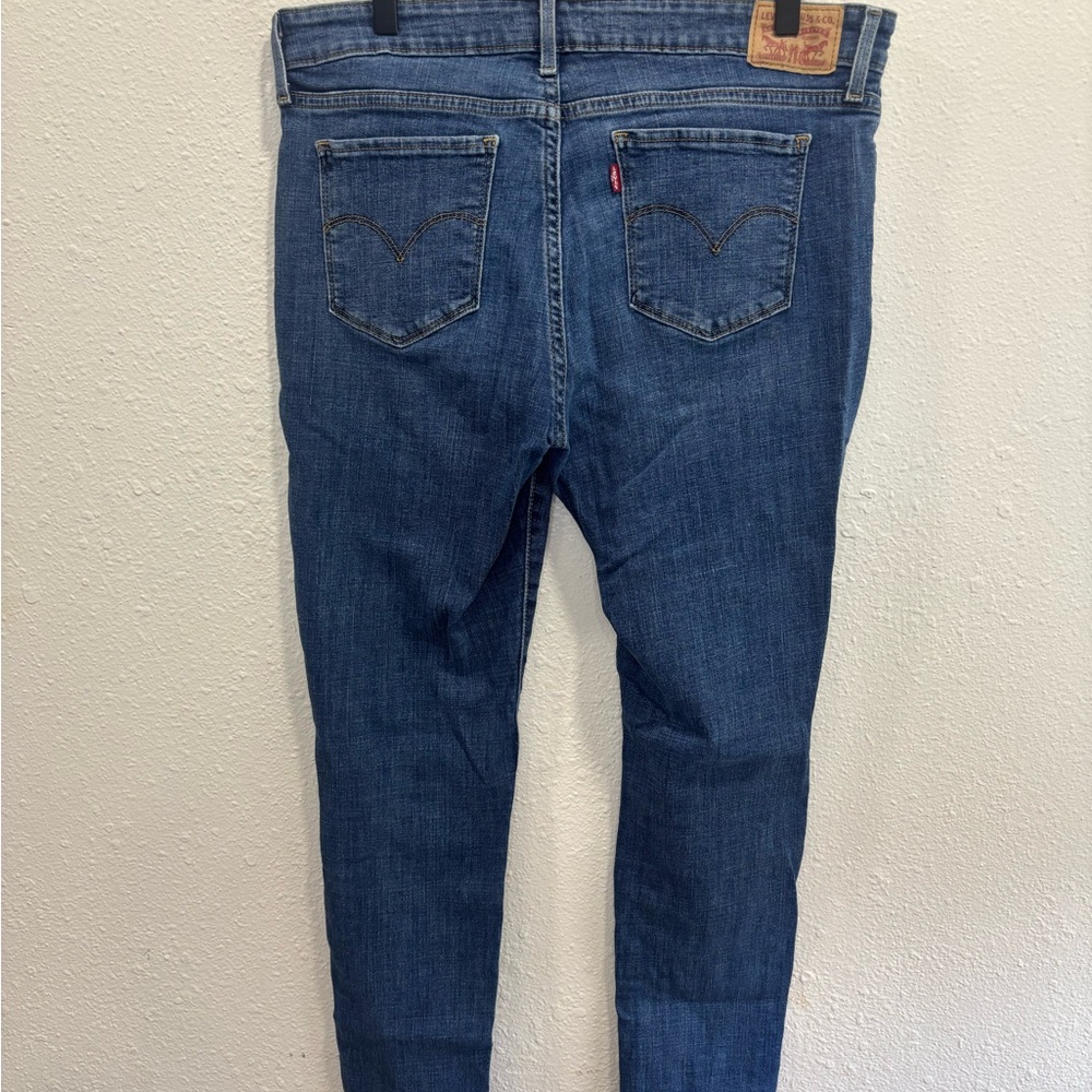 Levi's 711 Skinny Mid Blue Denim Jeans with Back Pocket Tab